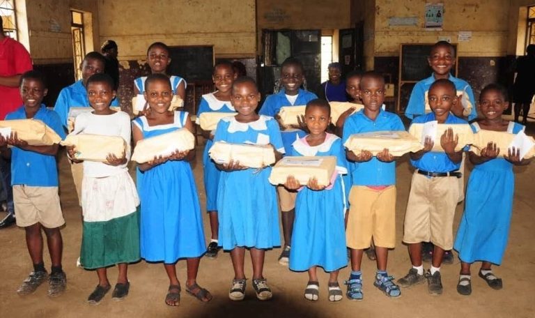Children at one of the three partner schools at the handover of the school materials for the school year 2024/2025.